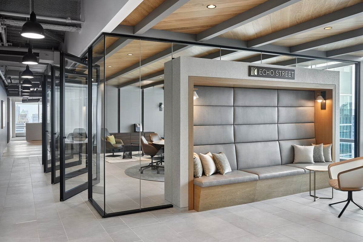 Office with glass accordion door with architectural glazing by Transwall